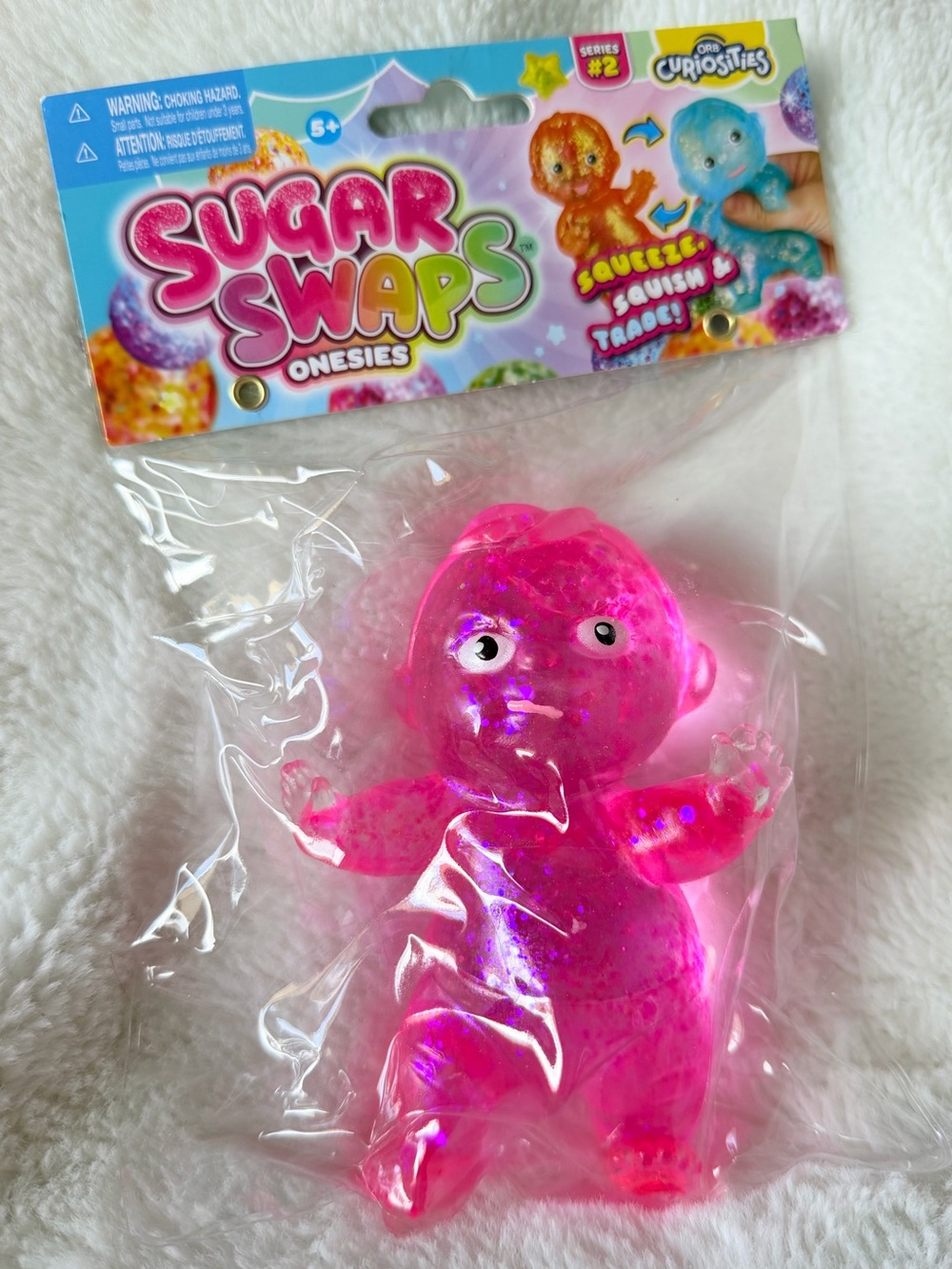 NWT ORB Curiosities Sugar Swaps Onesies Series 2 Pink Glitter Squishy Baby